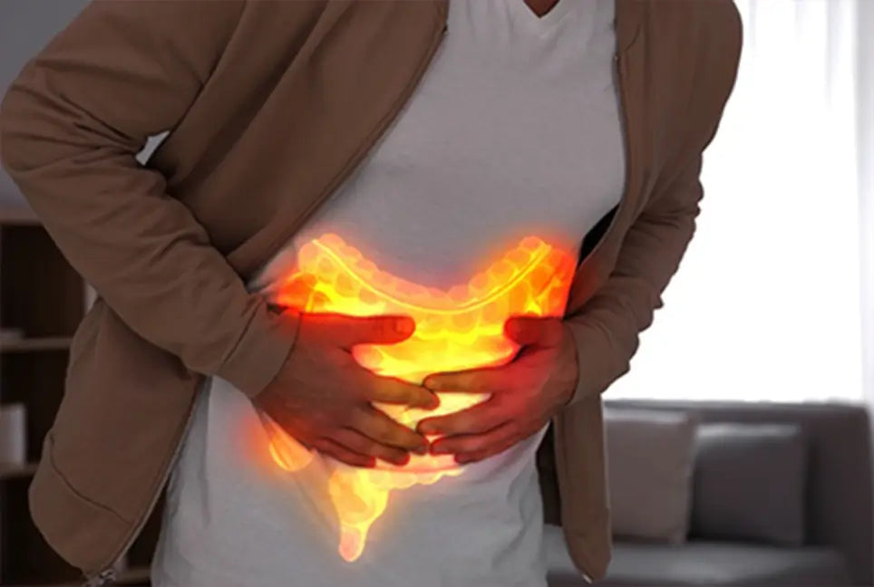 Woman experiencing stomach discomfort