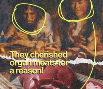 Two people in primitive clothing handling raw meat and organs on a wooden table.