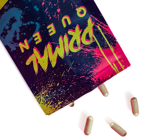 Colorful packaging with the text 'PRIMAL QUEEN' and capsules spilling out.